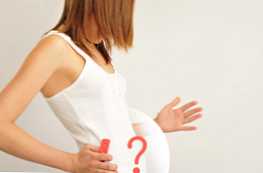 Kakšna je razlika med PMS in znaki nosečnosti?